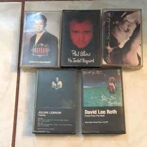 Five music cassettes of 1980s music